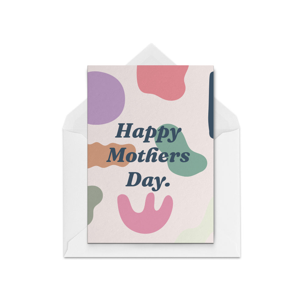 A Mother's Day Greeting Card from New Zelaand based company The Paper People depicting purple, green and red random shapes with the the owrds Happy Mothers Day in black going across the card,